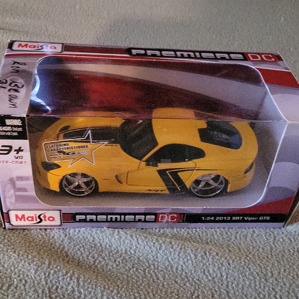 Yellow and Black Die-Cast Sports Car Model